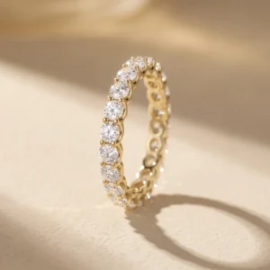 Full-eternity round diamond gold band ring in warm sunlight with soft shadow
