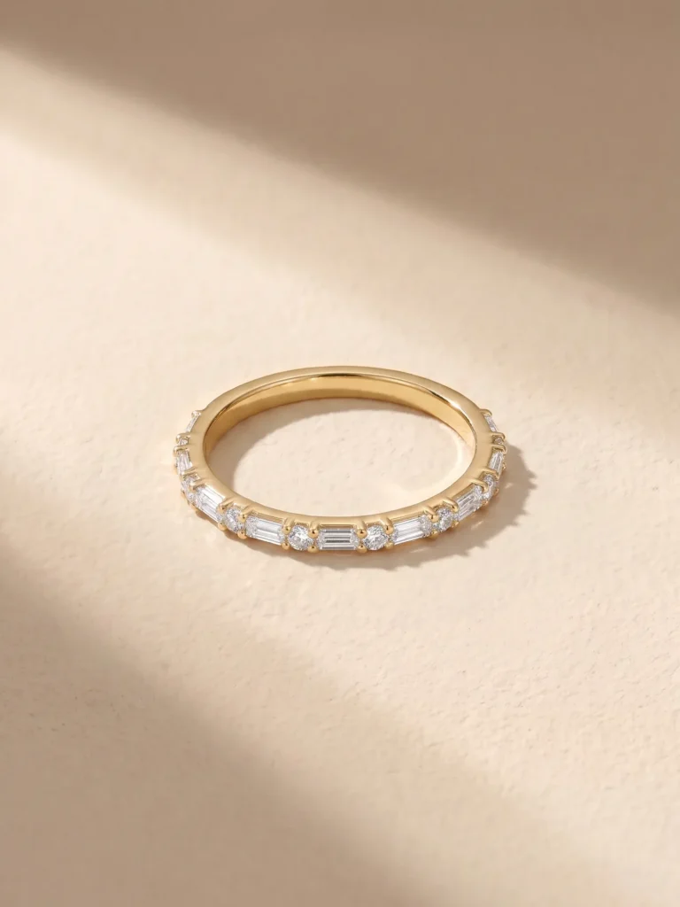 Slim gold band set with alternating baguette and round diamonds